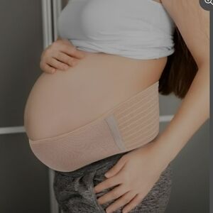 Cream-colored maternity support belt.